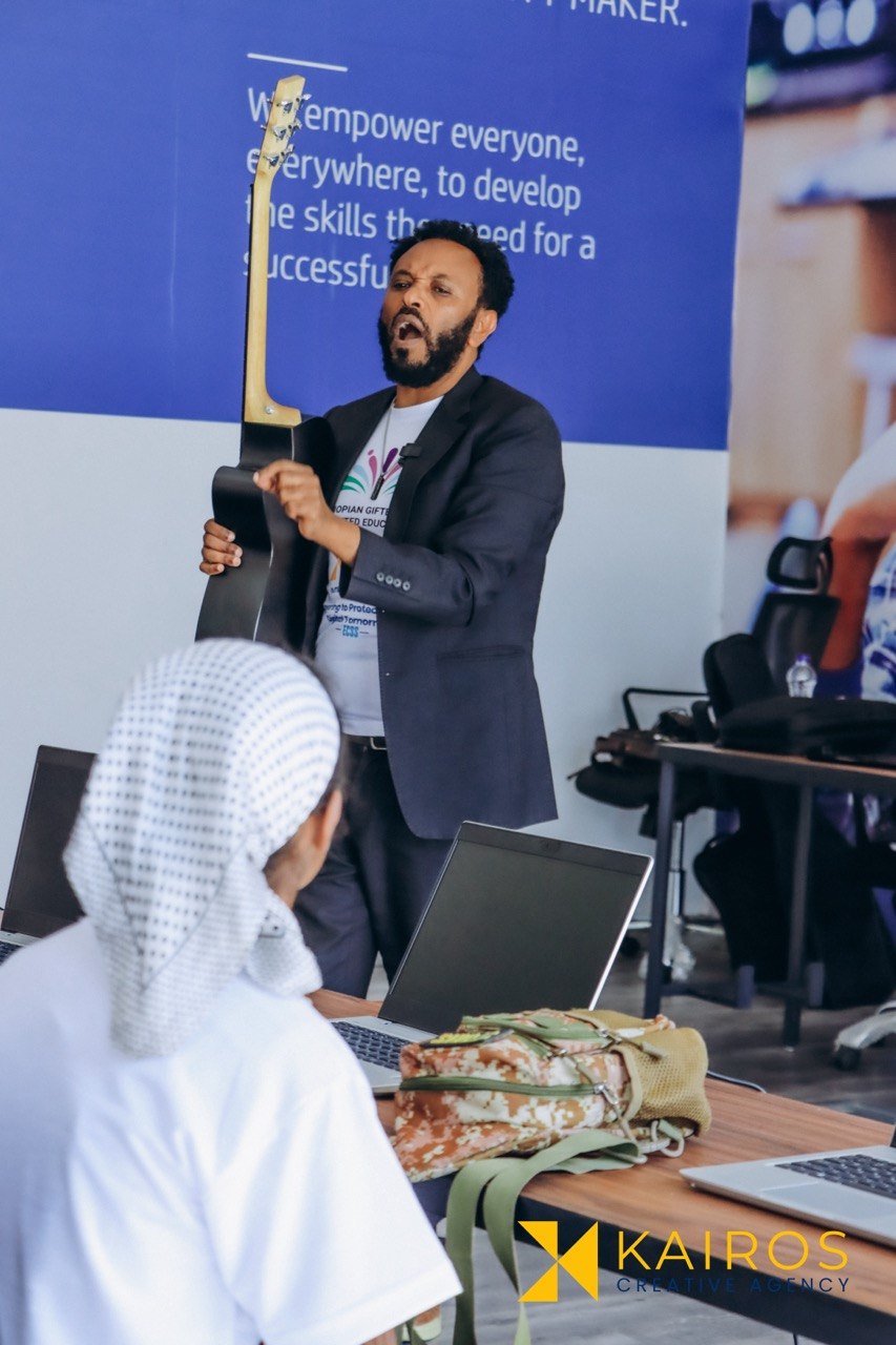 Mentor leading a hands-on cybersecurity session for the students